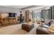 Bright and airy living room offering comfortable seating, modern amenities, and natural lighting at 1179 Ski Hill Rd # 147, Breckenridge, CO 80424