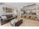 Inviting living room boasts comfortable seating, vintage decor, and a seamless flow into the adjacent kitchen at 1179 Ski Hill Rd # 147, Breckenridge, CO 80424