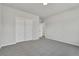 This bedroom features carpet floors and a closet with large sliding doors at 241 N Front St # 103, Monument, CO 80132