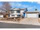 Ranch style home with attached garage and updated front door at 16305 E Gunnison Pl, Aurora, CO 80017