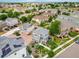 Desirable neighborhood showcasing well-kept lawns, mature trees, and charming homes at 18056 E 104Th Way, Commerce City, CO 80022