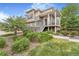 Charming two-story home with landscaped front yard and inviting porch at 18056 E 104Th Way, Commerce City, CO 80022