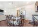 Well-lit kitchen with a large island and stainless steel appliances at 18056 E 104Th Way, Commerce City, CO 80022