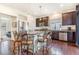 Kitchen island with granite countertop and seating for six at 18056 E 104Th Way, Commerce City, CO 80022