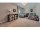 Well-appointed bedroom with twin beds, soft carpet, and ample storage, creating a cozy retreat at 10646 Winding Pine Pt, Highlands Ranch, CO 80126