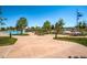 Community pool area surrounded by lush landscaping, lounge chairs, and clear blue skies, creating a relaxing outdoor space at 10646 Winding Pine Pt, Highlands Ranch, CO 80126