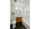Modern bathroom featuring stylish vanity, tiled walls, and sleek fixtures; a serene space to unwind at 12162 W Dakota Dr, Lakewood, CO 80228