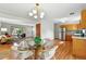 Open concept kitchen featuring a dining nook and seamless access to the living room at 12162 W Dakota Dr, Lakewood, CO 80228