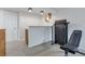 The finished basement includes a wet bar, recreational area with exercise equipment, and modern lighting at 9424 E Girard Ave, Denver, CO 80231