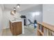 Finished basement features a wet bar, exercise equipment, and ample space for recreation and relaxation at 9424 E Girard Ave, Denver, CO 80231