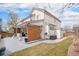Large backyard patio with a wooden privacy screen, perfect for outdoor entertaining at 3764 Balderas St, Brighton, CO 80601