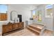 Welcoming entryway with a stylish wooden cabinet and bench seating at 1046 N Knox Ct, Denver, CO 80204