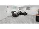 Basement living room featuring neutral carpet flooring and plush leather seating at 5441 S Dayton Ct, Greenwood Village, CO 80111