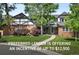Charming two-story home with a brick facade, manicured lawn, and inviting walkway to the front door at 5441 S Dayton Ct, Greenwood Village, CO 80111