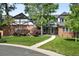 Charming brick Tudor-style home featuring well-manicured landscaping and a welcoming entrance at 5441 S Dayton Ct, Greenwood Village, CO 80111