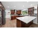 Spacious kitchen with stainless steel appliances and large island at 5441 S Dayton Ct, Greenwood Village, CO 80111