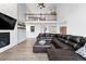 Open living room features a modern fireplace, high ceilings, and comfortable seating area at 5441 S Dayton Ct, Greenwood Village, CO 80111