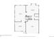 First floor plan featuring the kitchen, living room, dining room, laundry, and garage at 4526 Lyndenwood Pt, Highlands Ranch, CO 80130