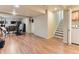 Finished basement with hardwood floors and plenty of room for a home gym and entertainment at 301 Harvest St, Longmont, CO 80501