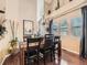 Dining room with hardwood floors, a chandelier, and views of the kitchen, perfect for entertaining at 301 Harvest St, Longmont, CO 80501