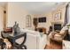 Cozy living room featuring a fireplace, stylish decor, and comfortable seating at 301 Harvest St, Longmont, CO 80501