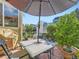 Patio with outdoor dining table and chairs, perfect for enjoying the backyard at 301 Harvest St, Longmont, CO 80501
