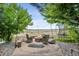 Inviting outdoor fire pit area with seating, perfect for relaxing and enjoying open space views at 4848 Wagontrail Ct, Parker, CO 80134