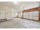 Spacious three car garage with ample room for parking and storage, plus convenient overhead doors at 594 Fall River Ct, Brighton, CO 80601