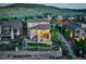 Aerial view of a home, backyard, and hillside landscape at dusk at 9441 Night Star Pl, Lone Tree, CO 80124