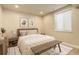 Cozy bedroom with a comfortable bed, stylish decor, and natural light at 9441 Night Star Pl, Lone Tree, CO 80124
