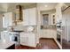 Bright kitchen with stainless steel appliances, stone backsplash, and ample counter space at 9441 Night Star Pl, Lone Tree, CO 80124