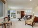 Upstairs living room with lots of light, comfortable seating, and a view, perfect for entertaining friends and Gathering at 9441 Night Star Pl, Lone Tree, CO 80124
