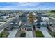 Aerial view of the community featuring homes, solar panels, yards, and landscaping at 3844 Sandy Vista Ln, Castle Rock, CO 80104