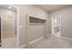 Neutral bedroom boasts carpet floors, base molding and adjoins a walk-in closet and ensuite bath at 3844 Sandy Vista Ln, Castle Rock, CO 80104