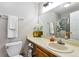Well-lit bathroom with essential fixtures, decorative elements and a neutral color palette at 14208 E 1St Dr # C1, Aurora, CO 80011