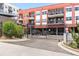 Apartment building with secure gated parking entrance for tenants and guests at 2518 16Th St, Denver, CO 80211