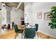 Elegant dining area with round glass table, stylish velvet chairs, and modern decor at 2518 16Th St, Denver, CO 80211
