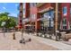 Mixed-use building with street-level retail space and outdoor seating at 2518 16Th St, Denver, CO 80211