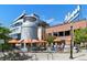 Charming ice cream shop with outdoor seating, a giant milk jug and an iconic sign at 2518 16Th St, Denver, CO 80211