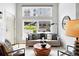 Bright, modern living room featuring stylish decor, large windows, and comfortable seating at 2518 16Th St, Denver, CO 80211