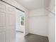 Walk-in closet with carpeted floor, shelving and a window for natural light at 11847 Trail View Ln, Parker, CO 80134