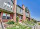 Well-maintained townhome row, showing the attractive architecture and landscaping at 17427 E Rice Cir # C, Aurora, CO 80015