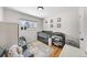 Bright Bedroom with a modern crib, charming decor, and a cozy seating area at 757 S Wheeling St, Aurora, CO 80012