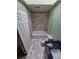 Bathroom with tub and tile shower, modern fixtures, and tiled floor to give the room a clean and stylish finish at 1962 S Ivory Way, Aurora, CO 80013