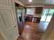 Modern kitchen featuring stainless steel appliances, stylish countertops, and plenty of cabinet space at 1962 S Ivory Way, Aurora, CO 80013