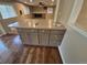 Kitchen island with granite countertops and seating space, great for entertaining at 1962 S Ivory Way, Aurora, CO 80013