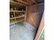 Shed interior features organized shelving, offering a practical space to store tools and garden equipment neatly at 1962 S Ivory Way, Aurora, CO 80013