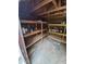 This shed interior features a wooden structure with shelving, offering ample storage space for various items and organizational needs at 1962 S Ivory Way, Aurora, CO 80013