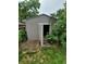 Exterior view of a shed offering extra storage space, nestled among plants, ideal for tools and equipment at 1962 S Ivory Way, Aurora, CO 80013