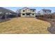 Large backyard featuring newly seeded grass and privacy fence at 11642 Moline Ct, Commerce City, CO 80640